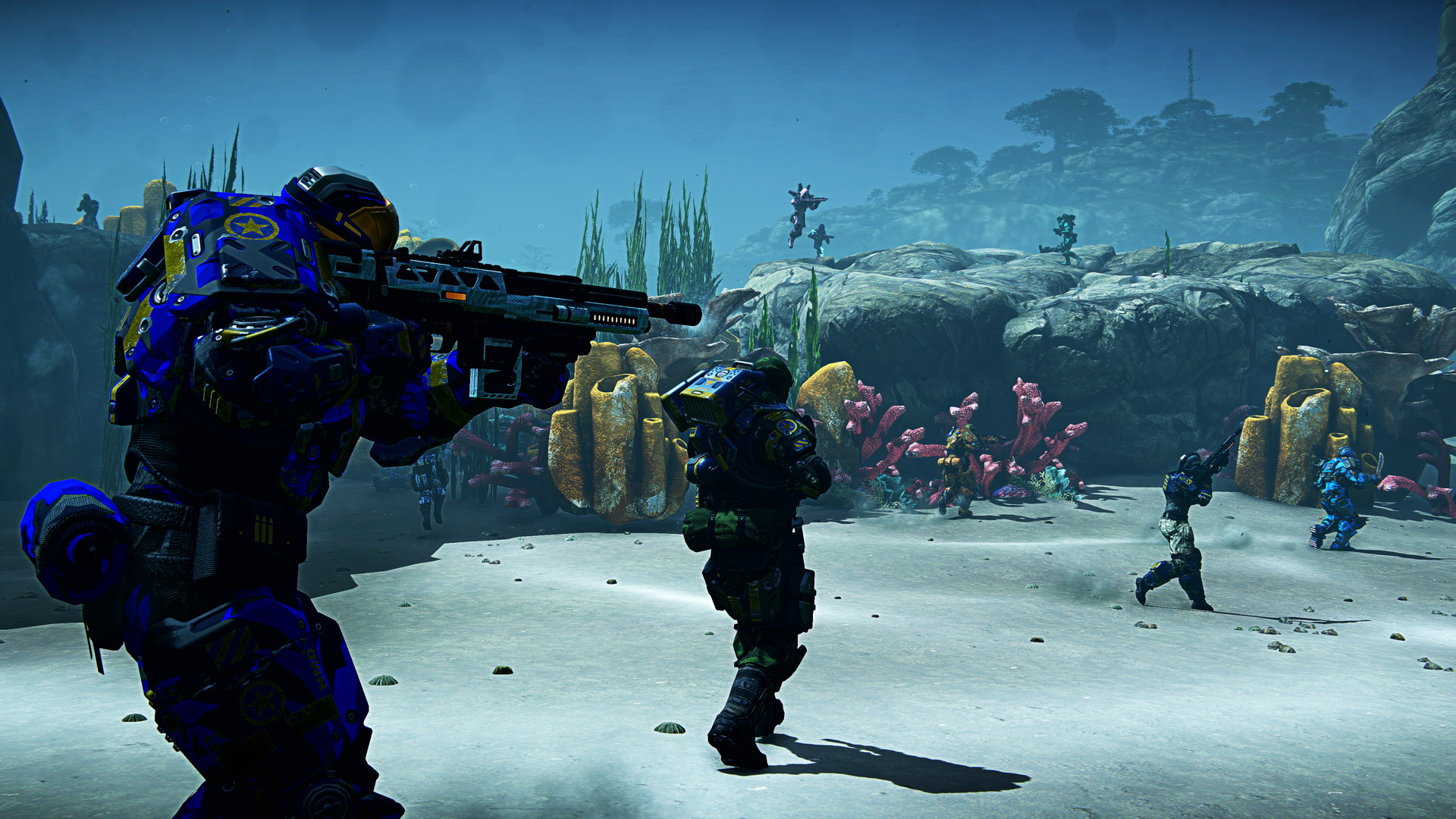Infantry assault supported by armor in Planetside 2.