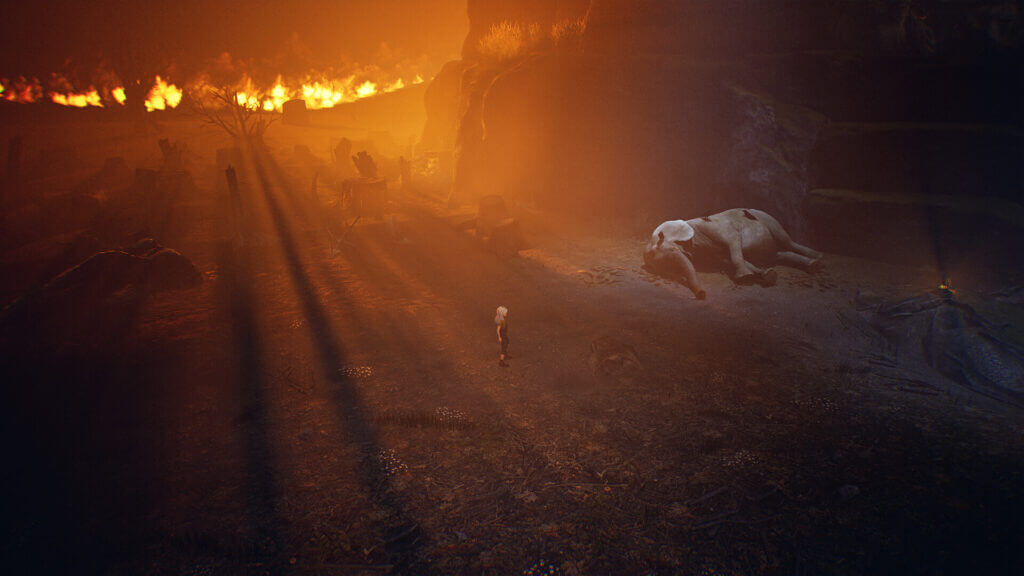 Ayasa stares at the body of a fallen white elephant, surrounded by fire and desolation.